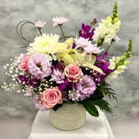 Loving Wishes ceramic pot flower arrangement with pink roses, orchids, lisianthus and seasonal flowers by Oopsy Daisy Flowers Melbourne