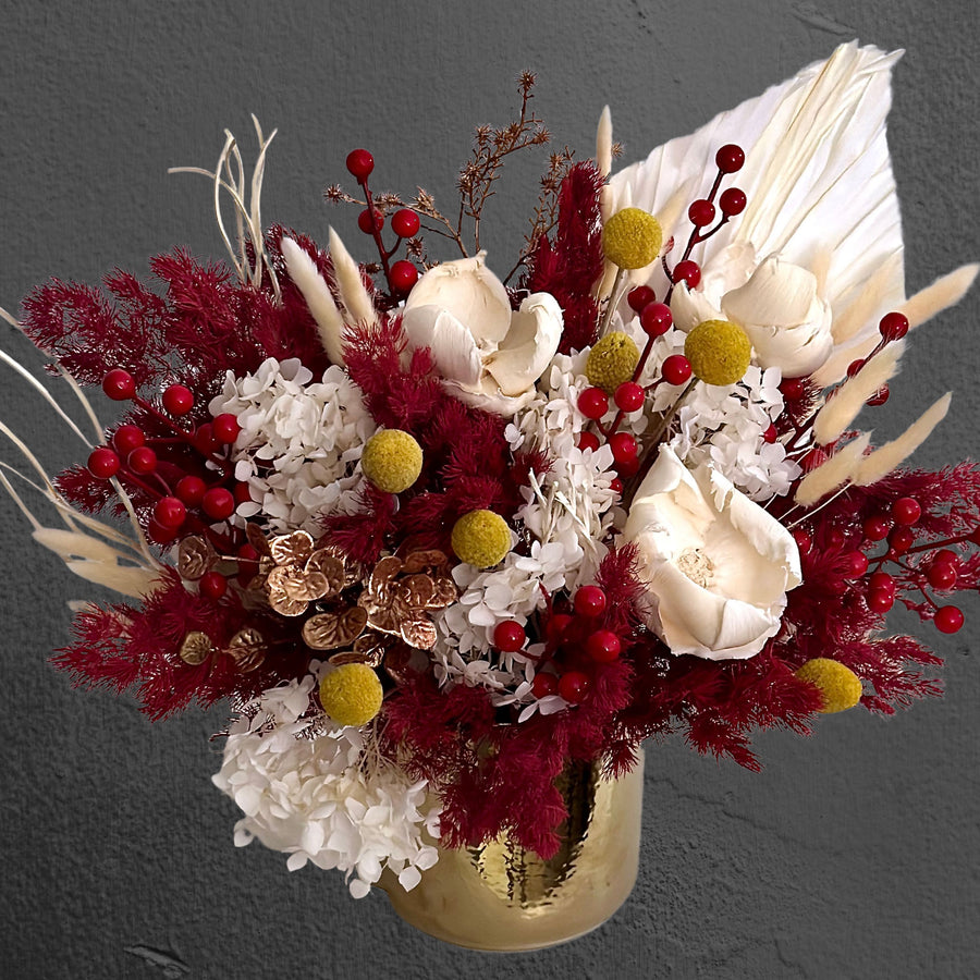 red and white preserved flower arrangement