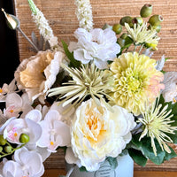 White and Yellow Artificial Flower Arrangement