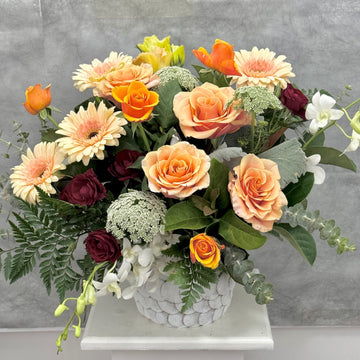 Champagne Flowers in a Pebble Vase