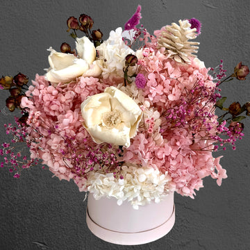pink and white preserved flower arrangement